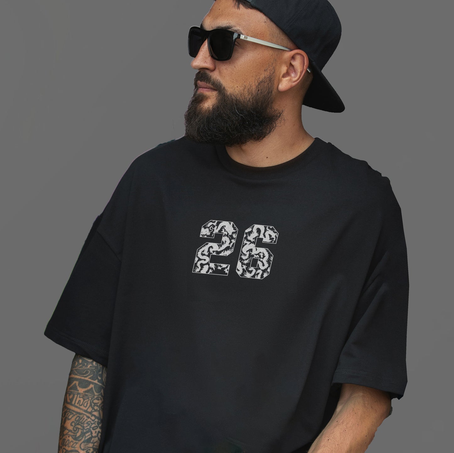 Our “26” tee drops now. Get yours in white or black.