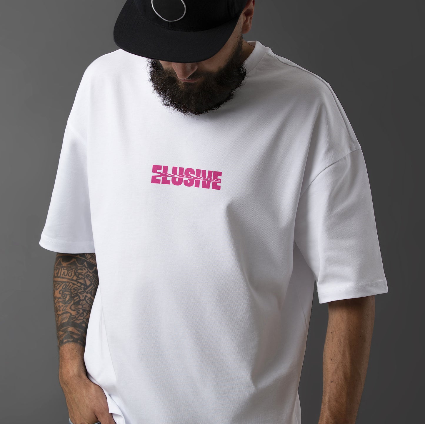 Stay elusive. Our latest tee drops now. White or black